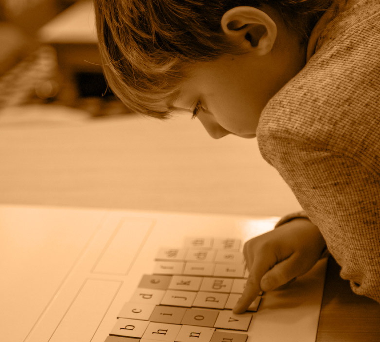 Child learning the alphabet.